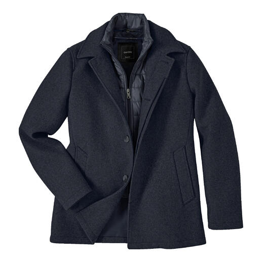 Manteau en laine respirant posé sur une surface plane.