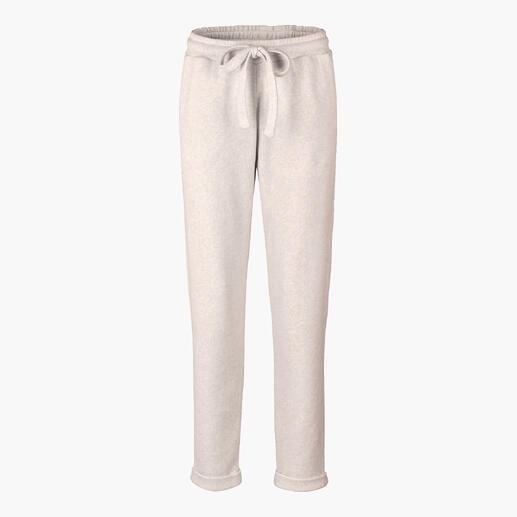 Pantalons de jogging beiges avec une taille élastique sur un fond blanc.