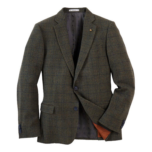 Blazer à carreaux sur fond blanc.