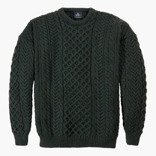 Pull en mérinos Aran vert sur fond blanc.