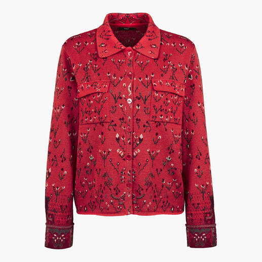 Blouse en jacquard rouge avec deux poches et des boutons.