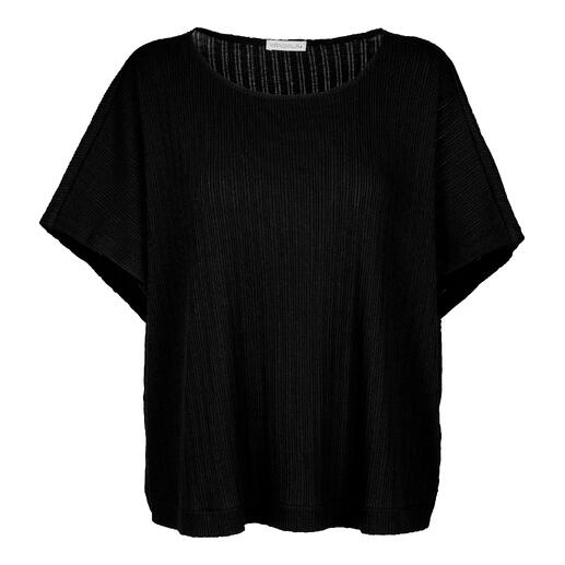 T-shirt de yoga noir ample à manches courtes.