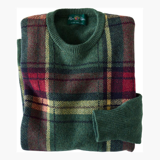 Pull tartan vert avec motif rouge-jaune, plié.