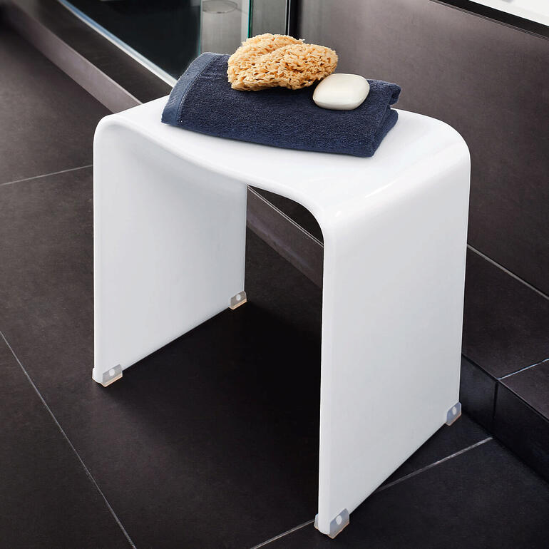 Tabouret de douche en acrylique, élégant et moderne, idéal pour la salle de bain.