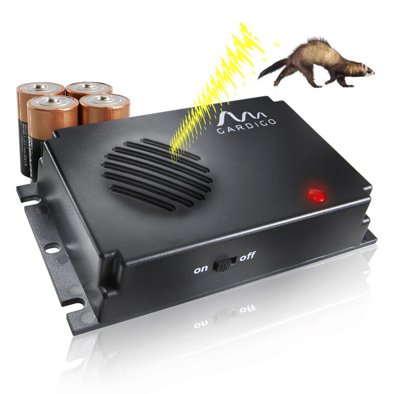 Appareil anti-fouine avec des piles et image d'une fouine.