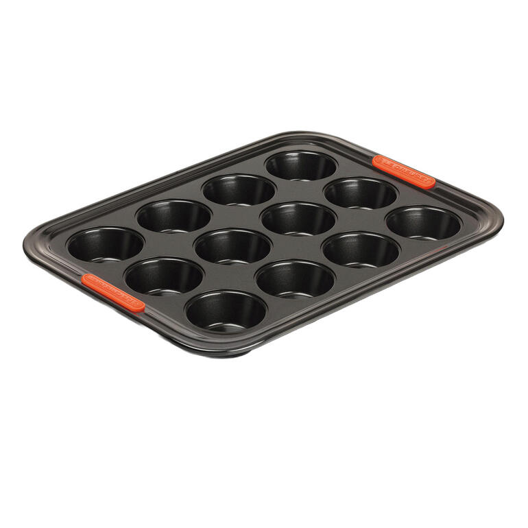 Moule à muffins Le Creuset avec 12 cavités.