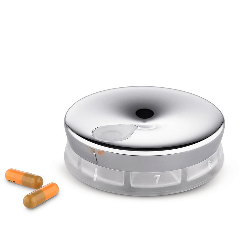 Boîte à pilules designer Alessi avec pilules, à prendre