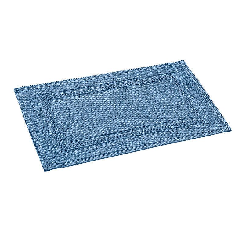 Tapis de bain sans peluches bleu, 60 x 90 cm, sur un sol lisse.