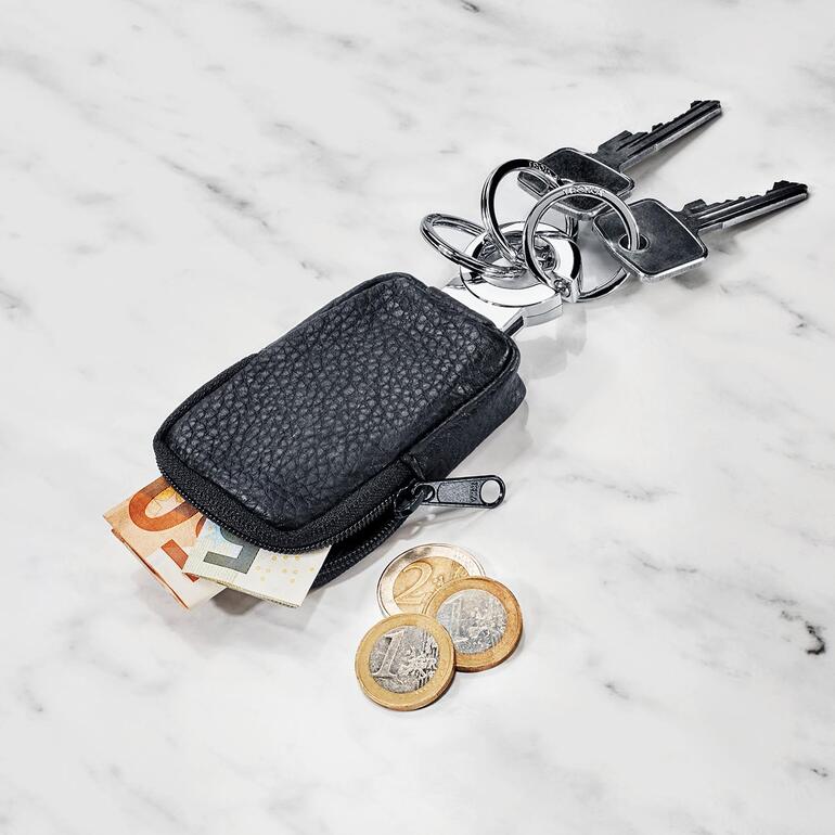 Porte-clés Pocket avec de l'argent liquide et des clés