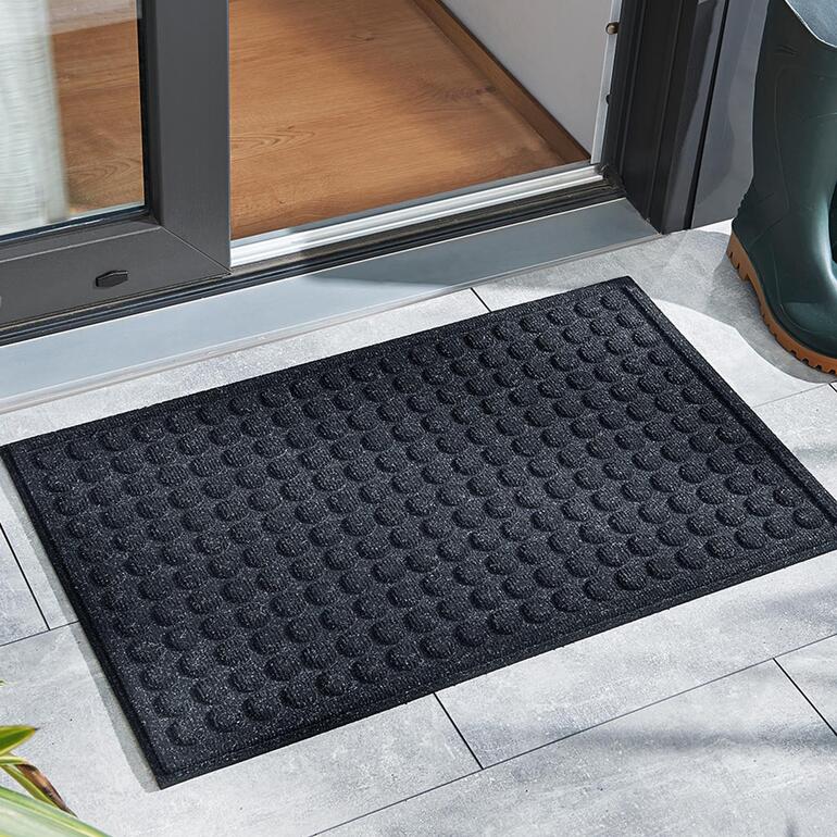 Tapis rectangulaire en caoutchouc recyclé, durable et antidérapant.