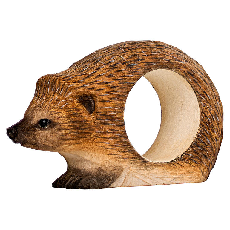 Hérisson Anneau de serviette en bois en forme de hérisson sur une table.