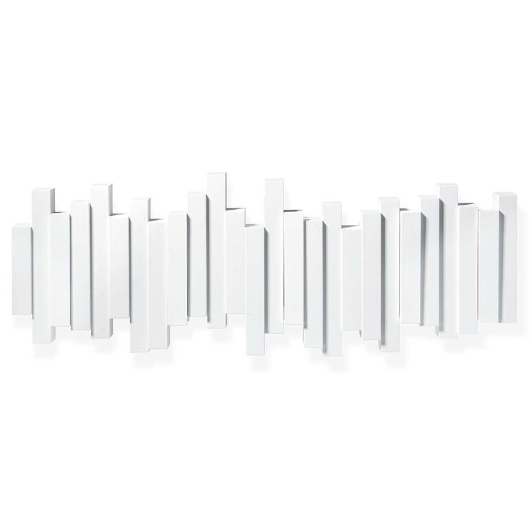 Astucieux : déplié c’est un porte-manteau, replié c’est un objet déco. Porte-manteau mural moderne en forme de touches de piano en blanc.