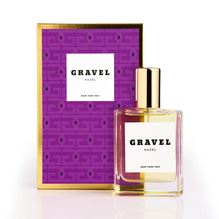 Gravel Hazel Eau de Parfum Spray dans une boîte orange et violette