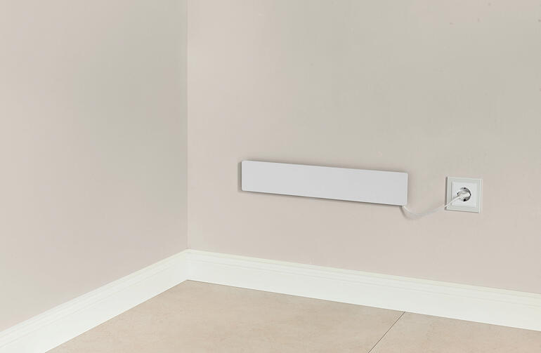 Panneau infrarouge en arrière-plan, conçu pour une fixation au mur.