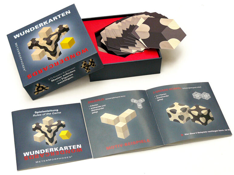 Boîte de jeu Wunderkarten et cartes avec instructions.