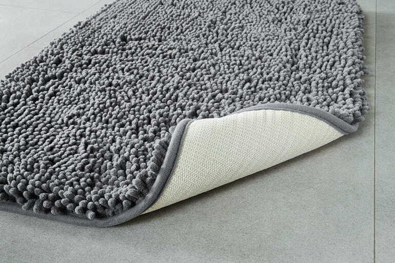 Gros plan sur la texture du tapis de nettoyage pour animaux.