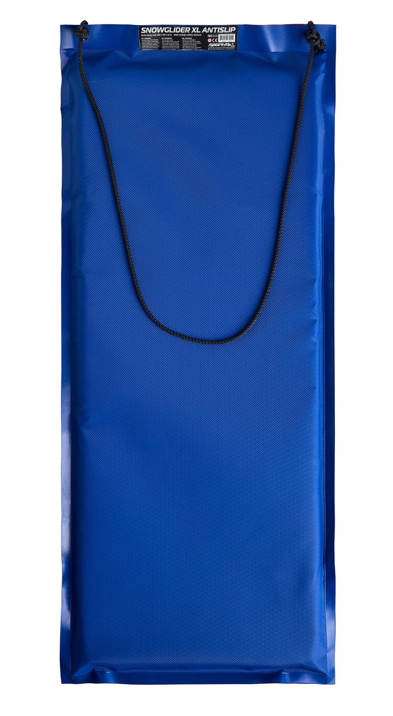 XL-luge à neige bleue posée sur un fond blanc.