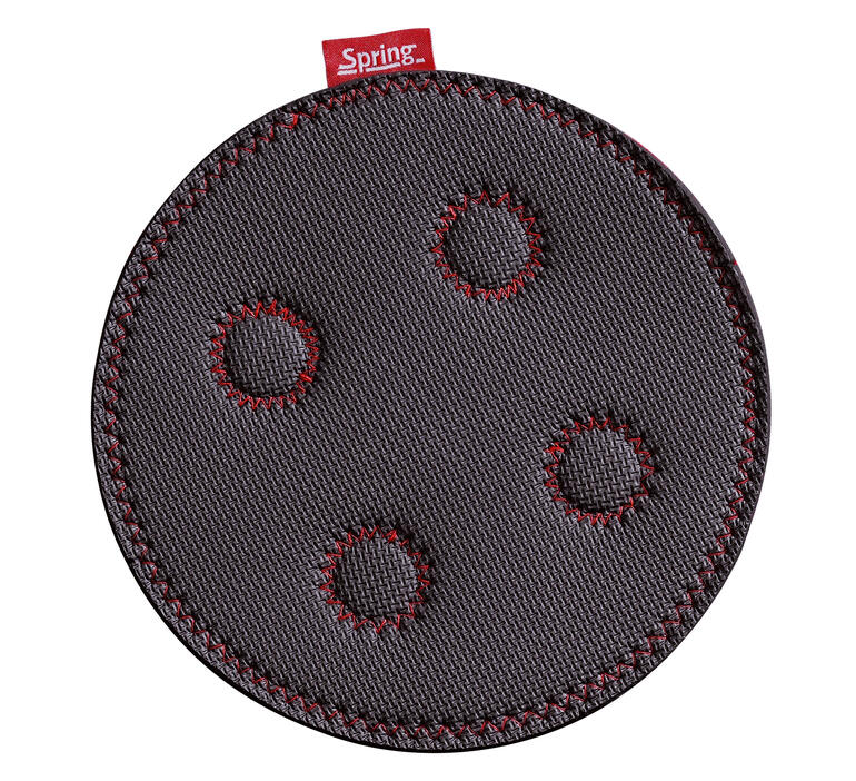 Sous-plat magnétique rond avec trois évidements.