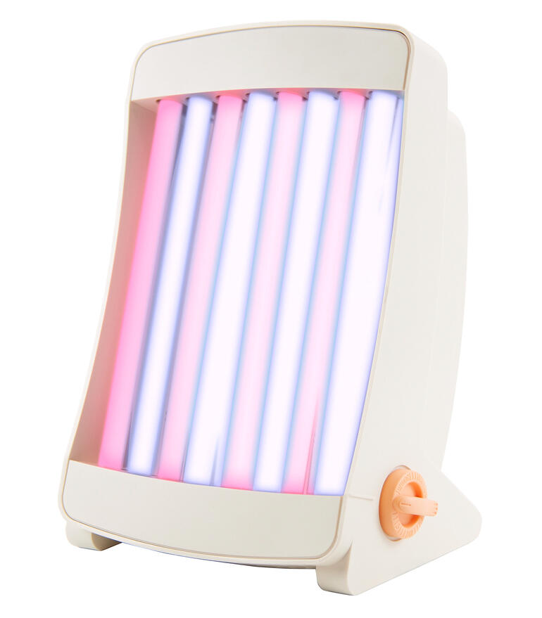 Bronzeur facial avec plusieurs tubes dans l'appareil.