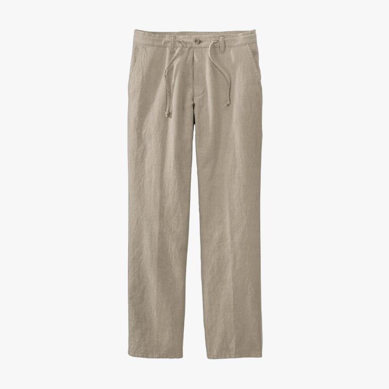 Pantalon de confort à cordon beige sur fond blanc.