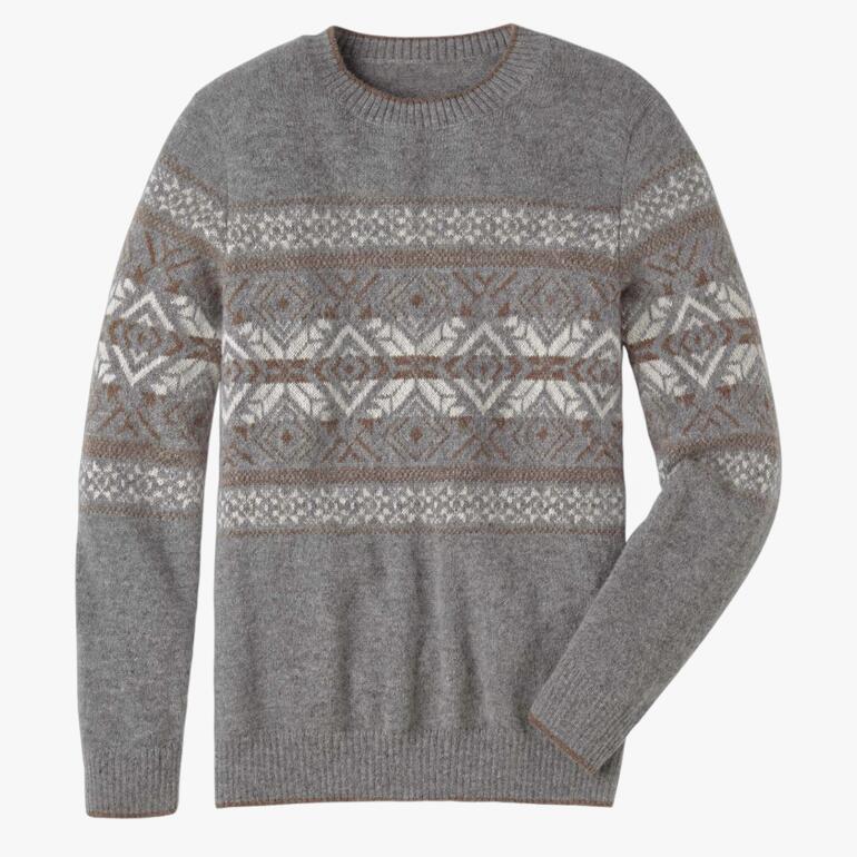 Pull norvégien en bébé alpaga gris avec motif géométrique sur fond clair.