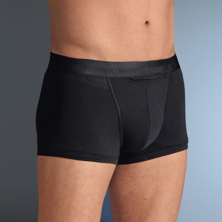 Boxer homme noir avec ceinture élastique, vu de côté.