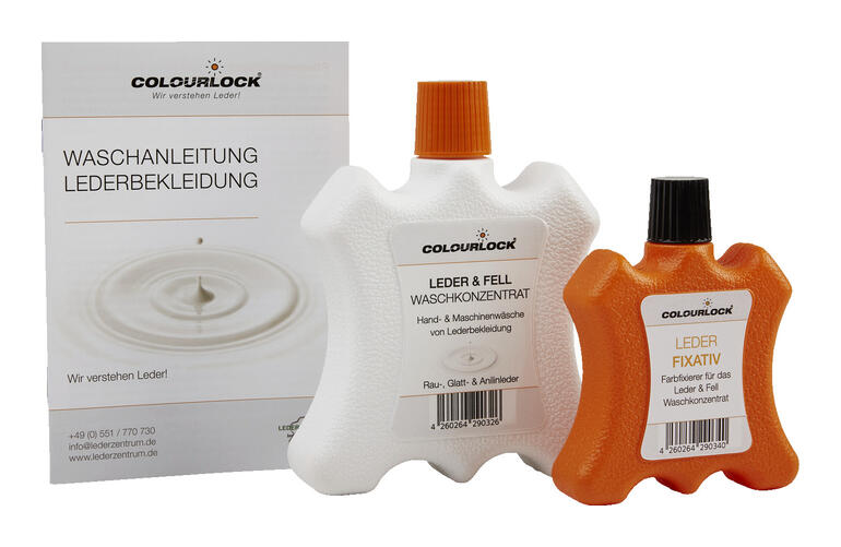 Bouteille de nettoyant pour cuir et fourrure à côté de fixatif.