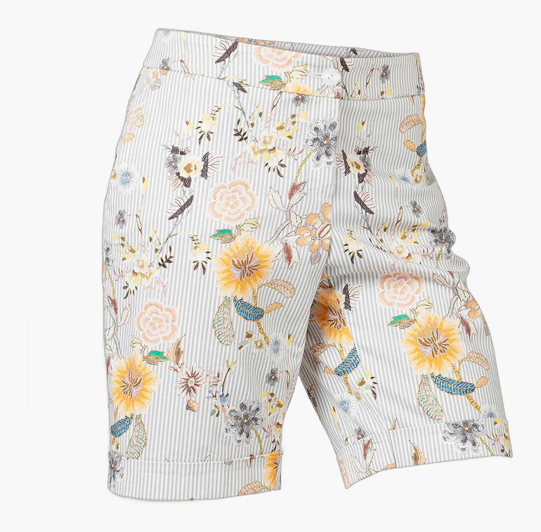 Bermuda shorts élégantes avec motif floral en couleurs pastel.