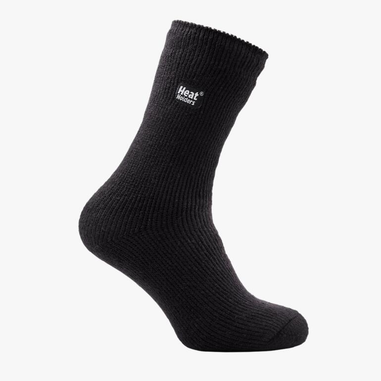 Chaussettes thermiques Heat Holders® en noir, debout