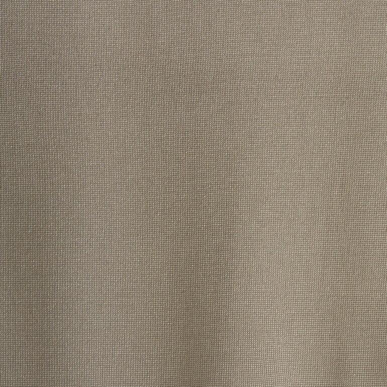 Col rond, Beige Gros plan de matériau en soie beige.