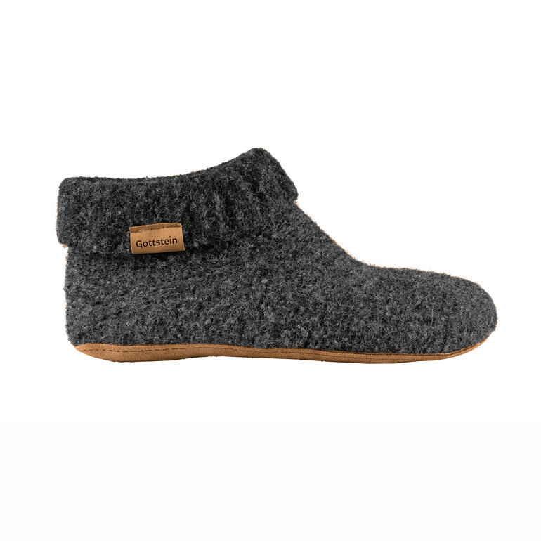 Vue latérale d'une botte Gottstein Walkstrick grise avec un logo.