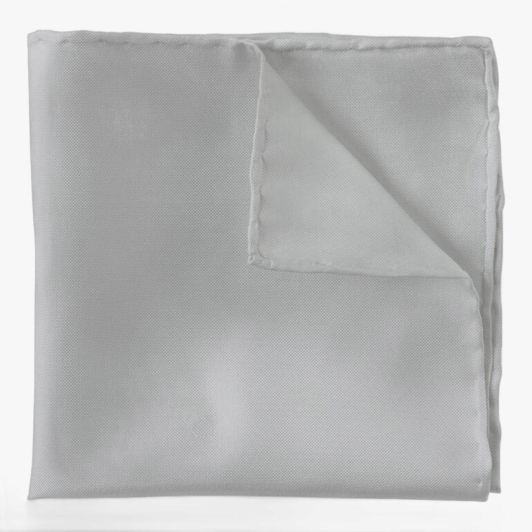 Pochette en soie Oxford claire pliée.