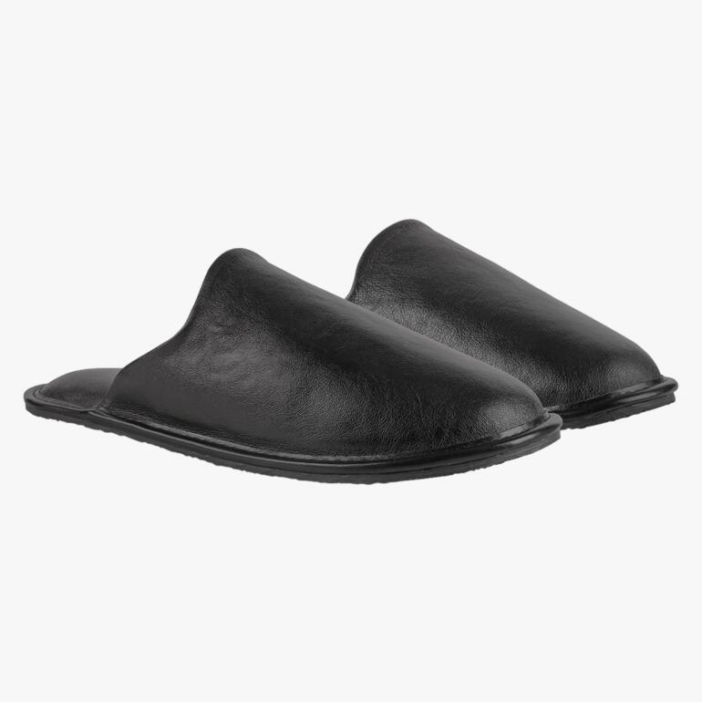 Deux chaussons en cuir Pillowstep noirs côte à côte.
