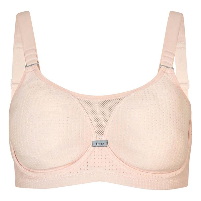Soutien-gorge de sport beige avec une structure en filet aérée à l'avant.