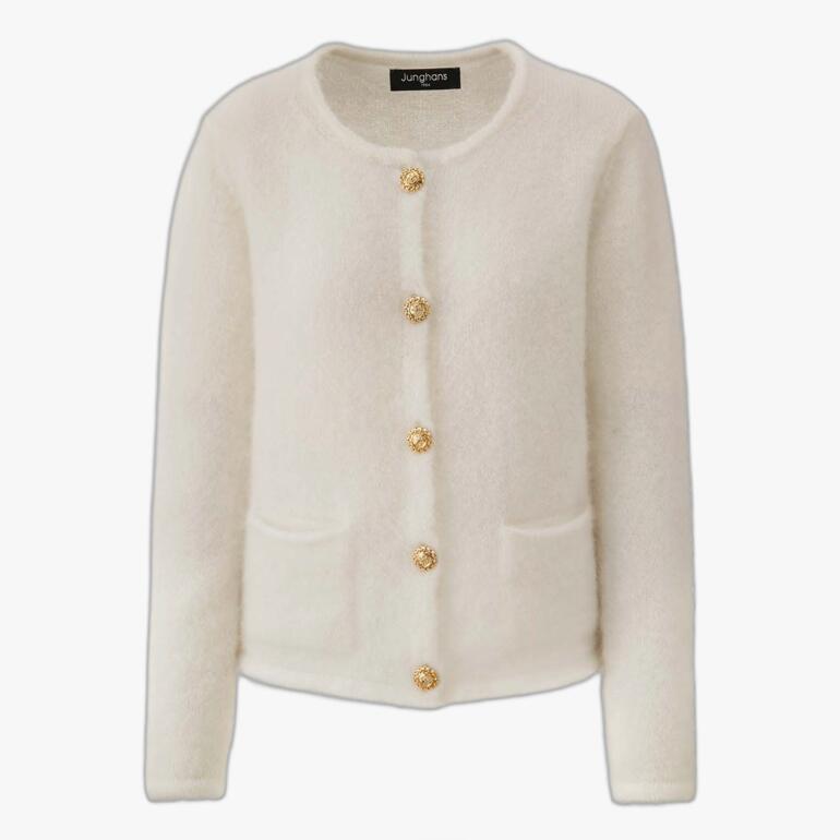 Cardigan en mohair blanc avec boutons et deux poches.