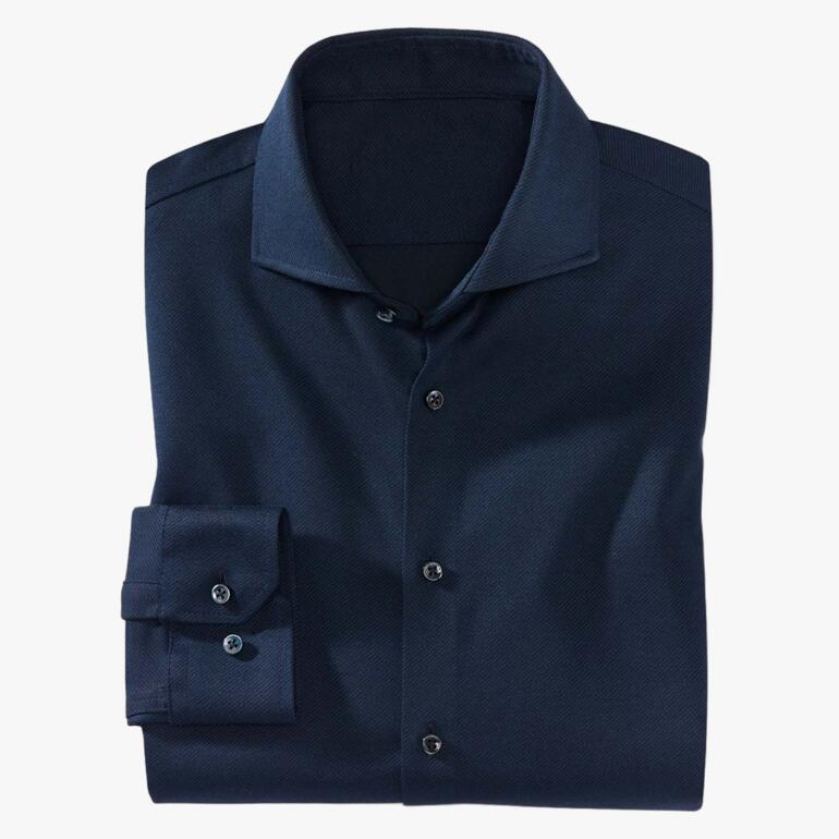 Chemise noire Desoto en jersey pliée avec boutons et poignet.