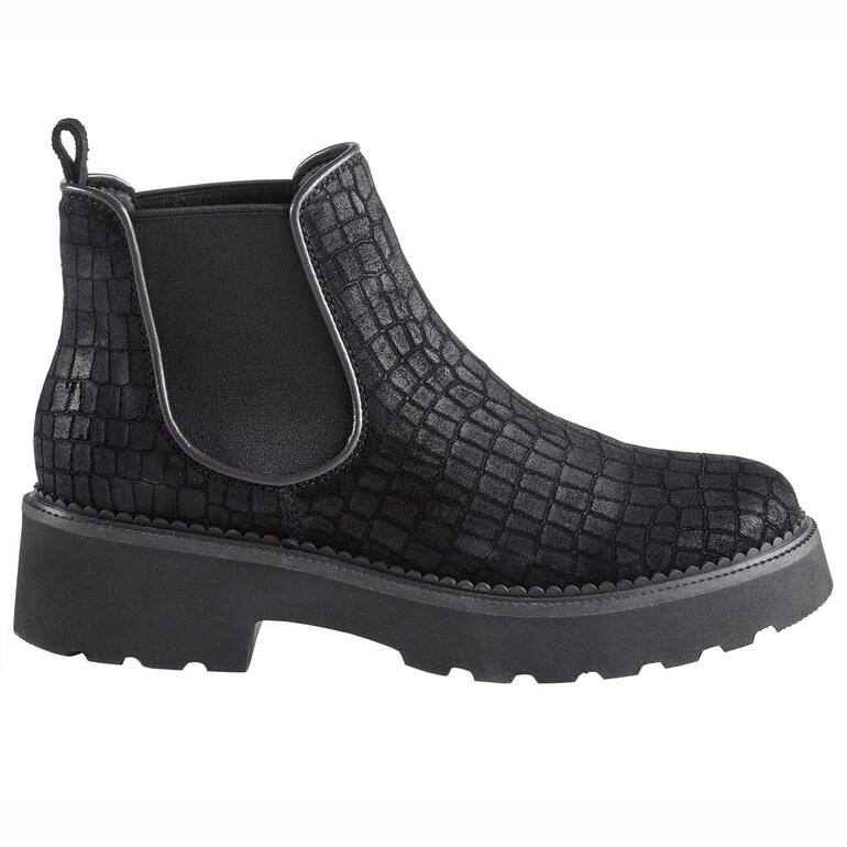 Vue latérale de bottes Chelsea noires avec texture.