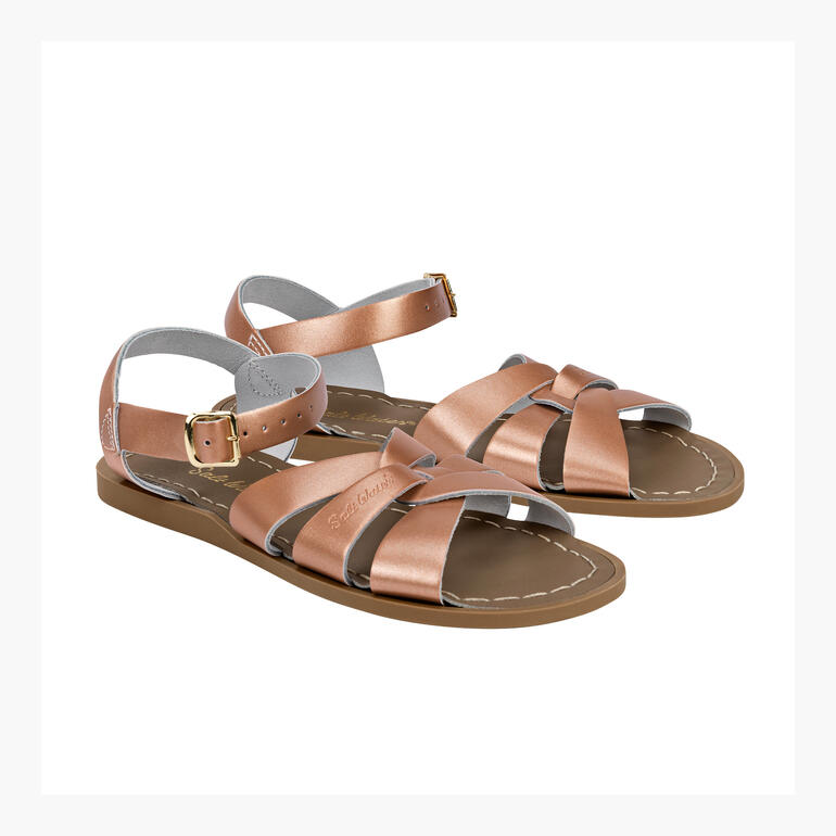 Sandales en cuir Salt-Water élégantes en or rose avec des brides étroites.