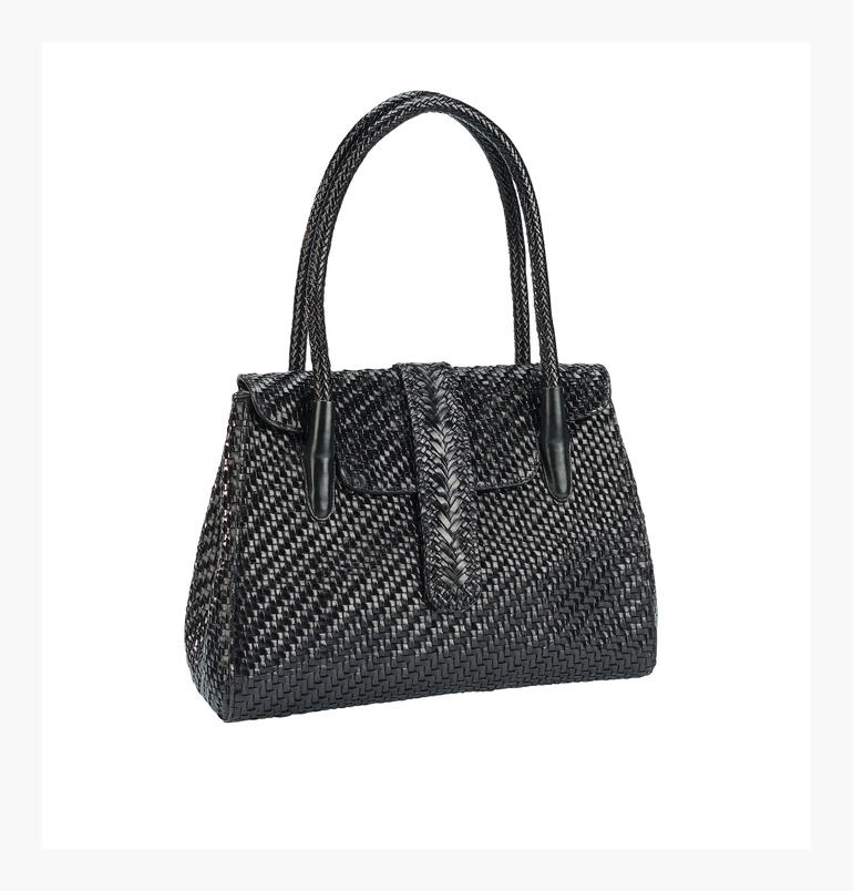 Sac tote en cuir tressé Allan K en noir, debout.