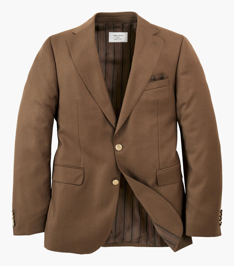 Blazer marron ouvert sur fond blanc, montrant l'intérieur.
