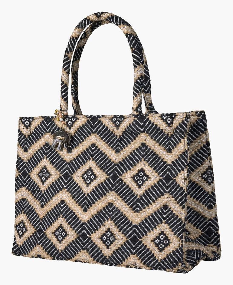 Sac fourre-tout en jacquard noir avec motif losange et anses.