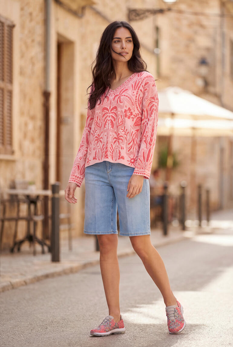 Pull en jacquard rose avec motif floral et manches longues