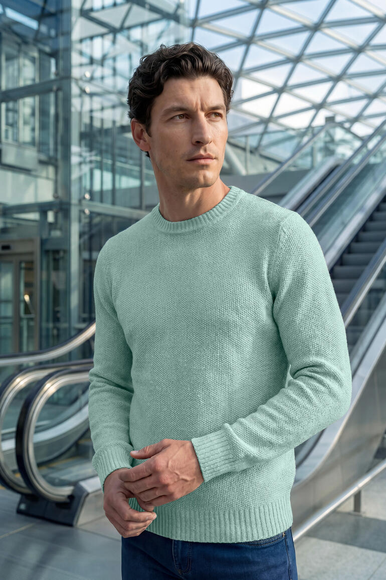 Gros plan du pull en E-riz menthe