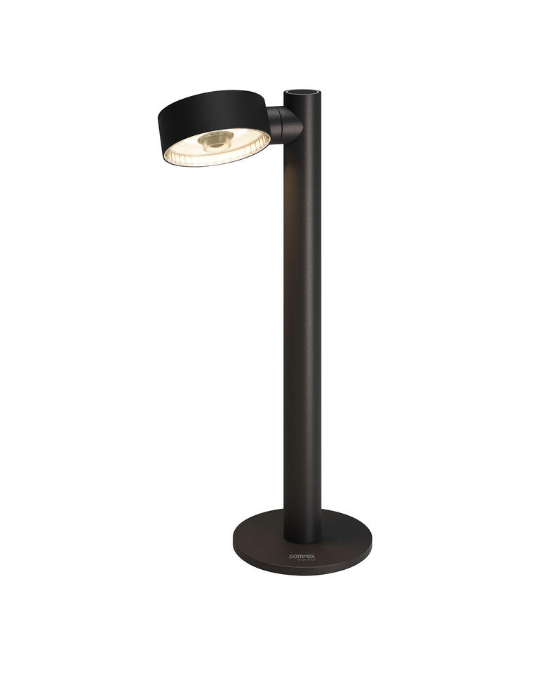Lampe de table à batterie noire avec une tête réglable sur un socle stable.